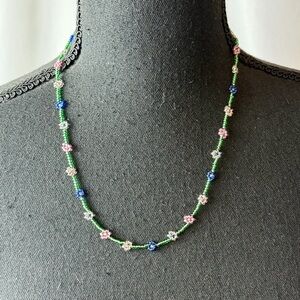 Handmade Green Beaded Necklace with Pink, Blue & White Flower Accents